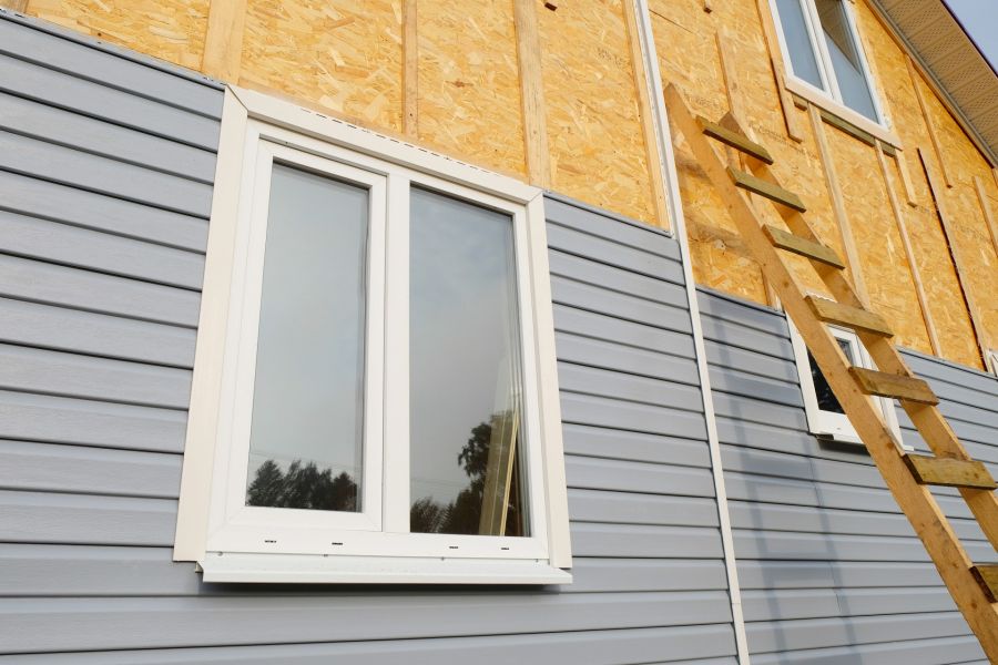 Siding Repair by JK Roofing & Construction